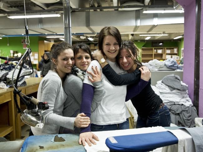 Beating addiction ... Hannah (second from right) in the laundry with other female residents. Picture: Ella Pellegrini