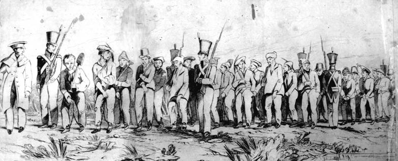 A line of convicts in chains, many holding spades or pick axes, are guarded by soldiers with rifles and bayonets. A commander at the front of the line looks back on the line.