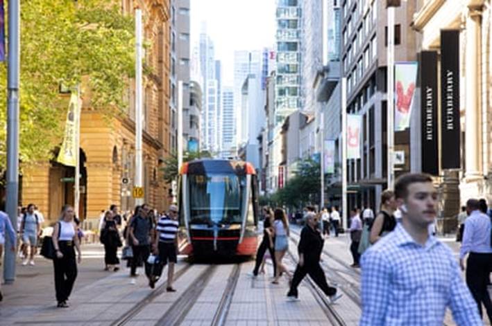 Trams make their way through Sydneys CBD in NSW, Australia, during morning peak hour.